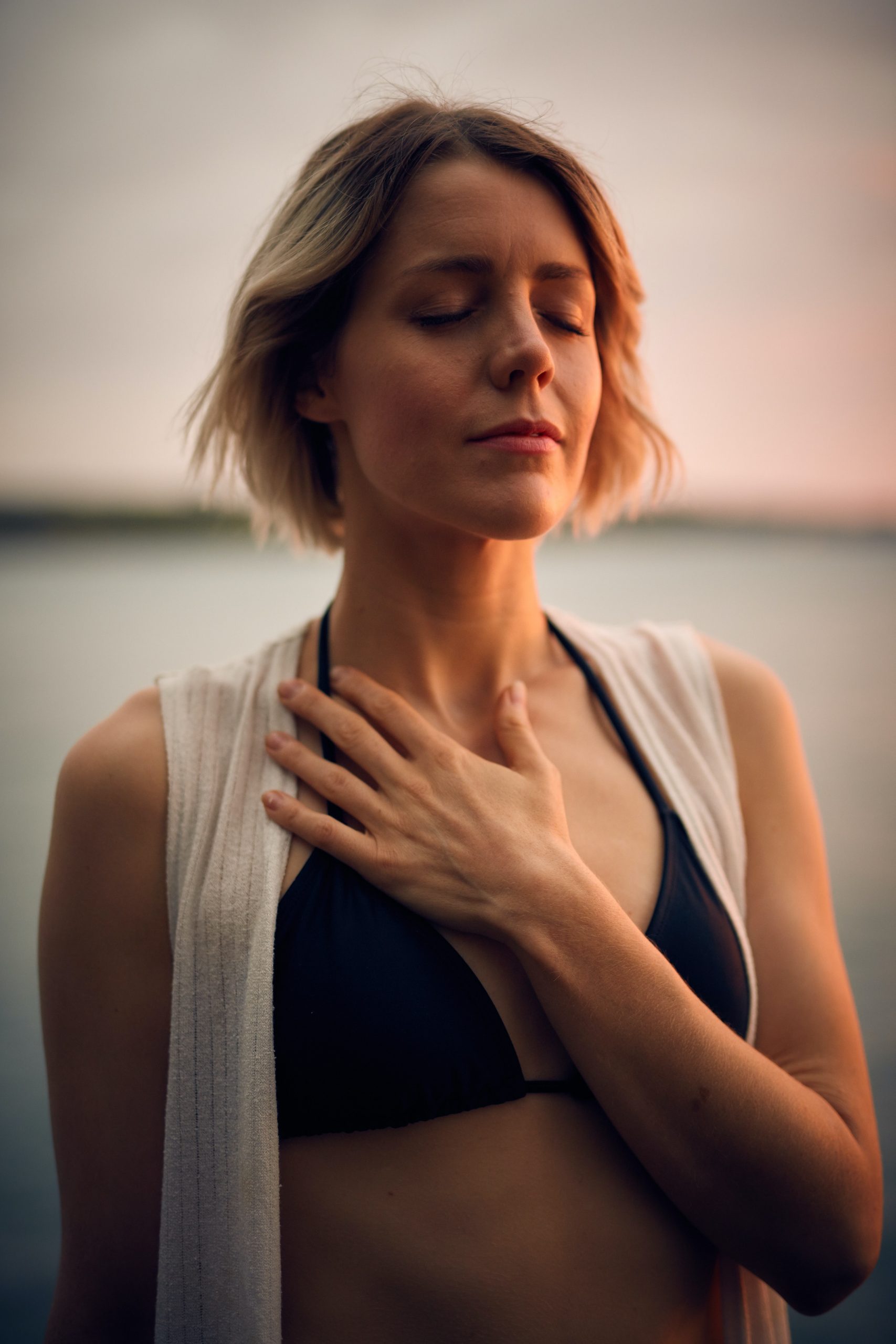 woman touching heart